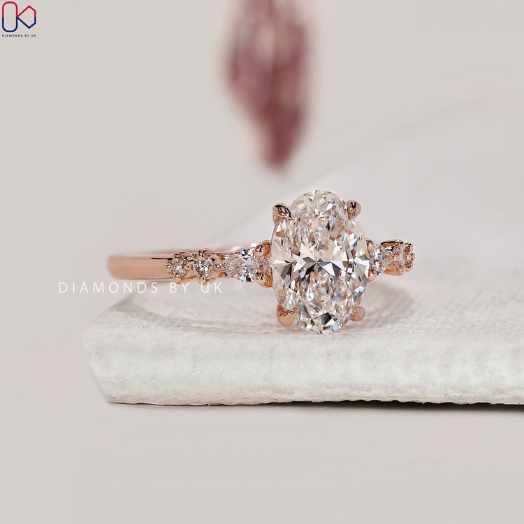 4 claw prong setting ring with lab grown oval diamond.
