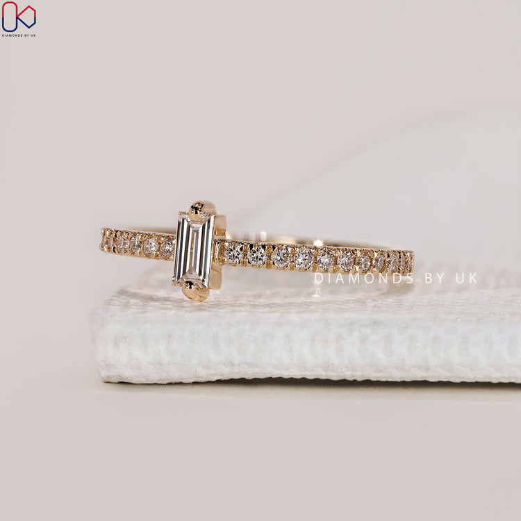 Half eternity wedding band with baguette diamond wedding band.

