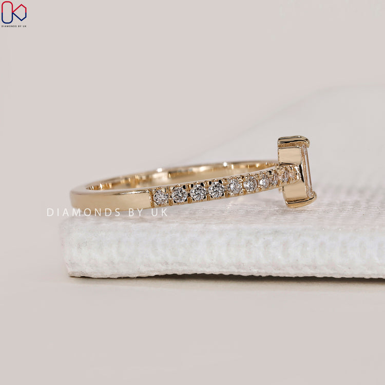 Round cut stone in a custom wedding band style.
