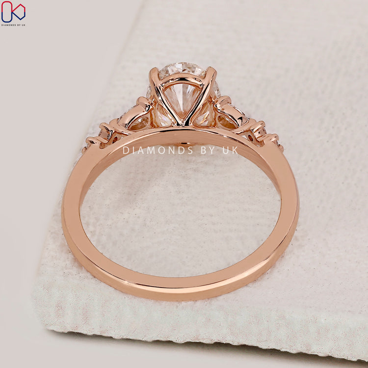 Cathedral setting ring with 7 stone diamond layout.
