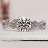 Round cut engagement ring in white gold.
