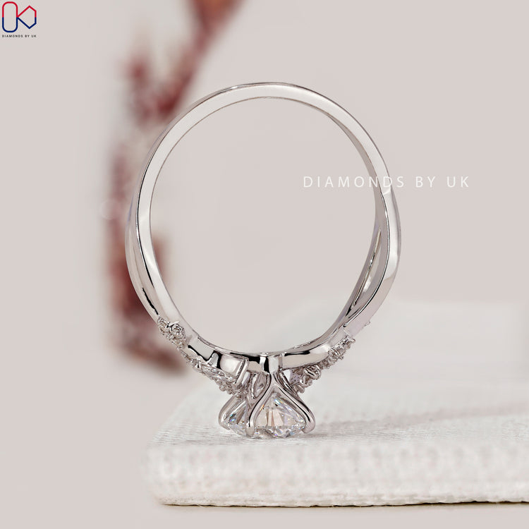 Lab grown round cut diamond engagement ring.
