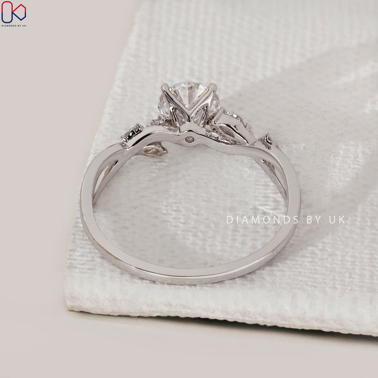 Elegant cluster diamond ring by Diamondsbyuk.
