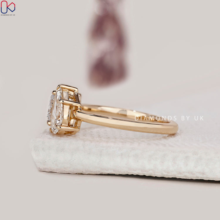 Yellow gold engagement ring with polished surface and secure fit.
