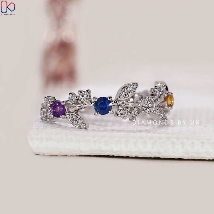 Handmade jewellery white gold band with half eternity style.
