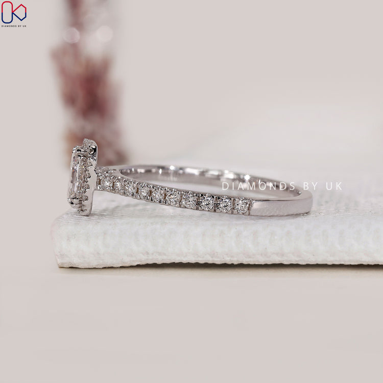 Double claw prong setting diamond engagement ring.
