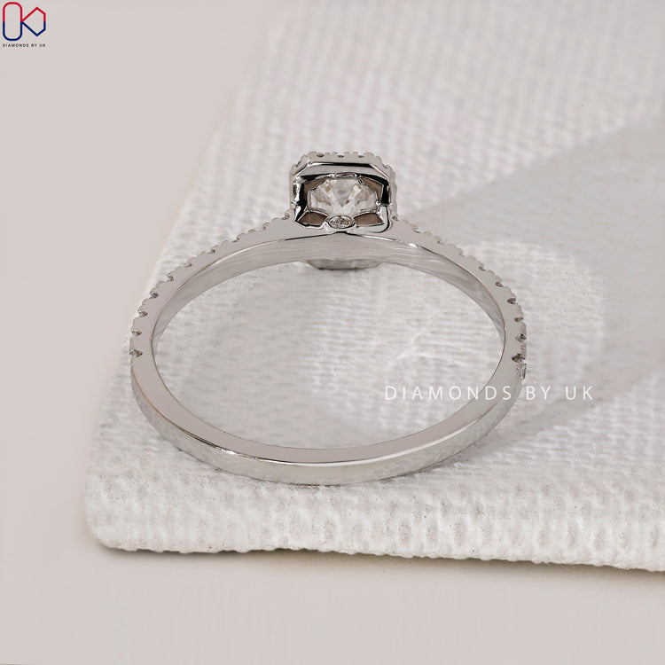 Handmade white gold halo engagement ring.
