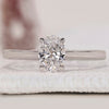 Oval Cut Diamond Ring featuring a 4 prong claw setting, set in a white gold.
