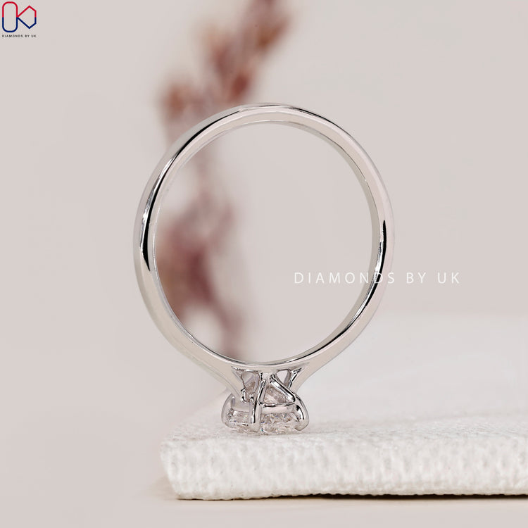 Diamondsbyuk Engagement Ring with a stunning oval cut diamond, set in a white gold.