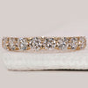 Half eternity wedding band with diamonds.
