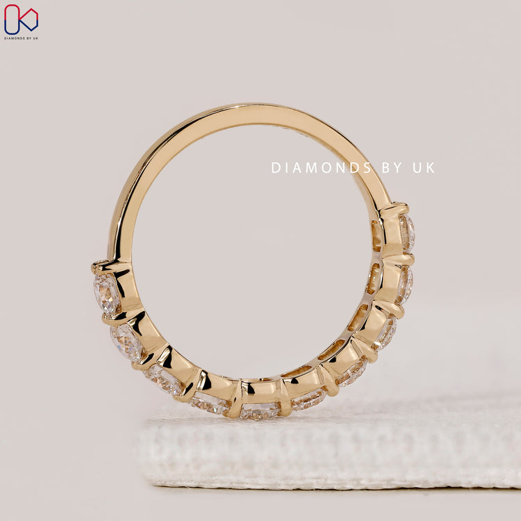 Diamondsbyuk half eternity wedding band.
