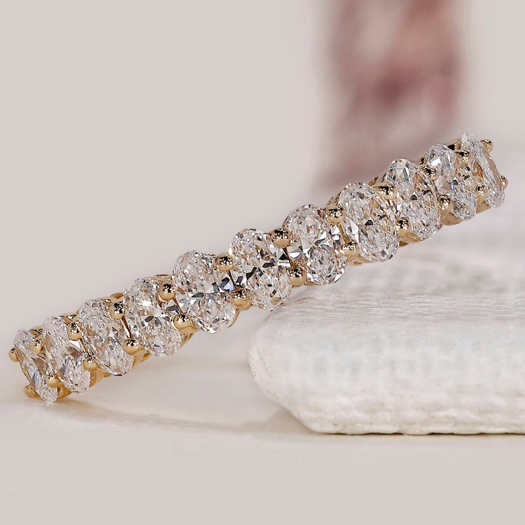 Half Eternity Oval Diamond Gold Band