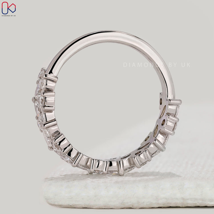 Handmade jewellery half eternity diamond band.
