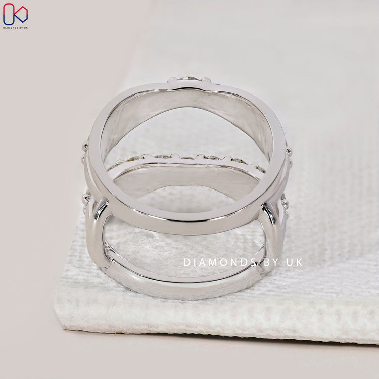 Diamondsbyuk wedding band with prong setting.
