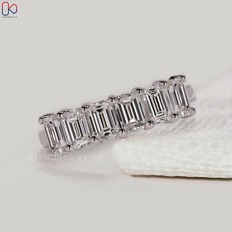 Buy wedding band in white gold.
