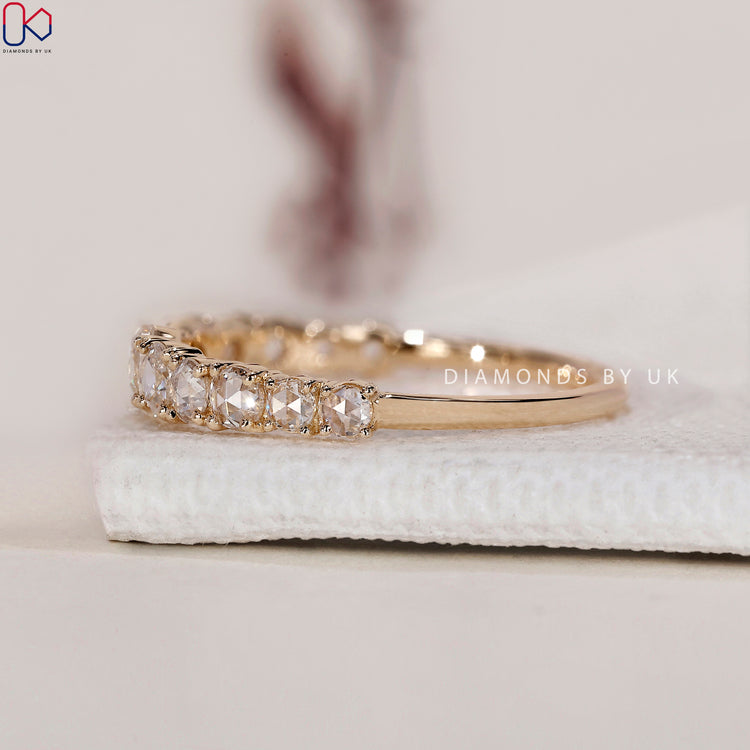 Yellow gold engagement band with sparkling rose cut diamonds.
