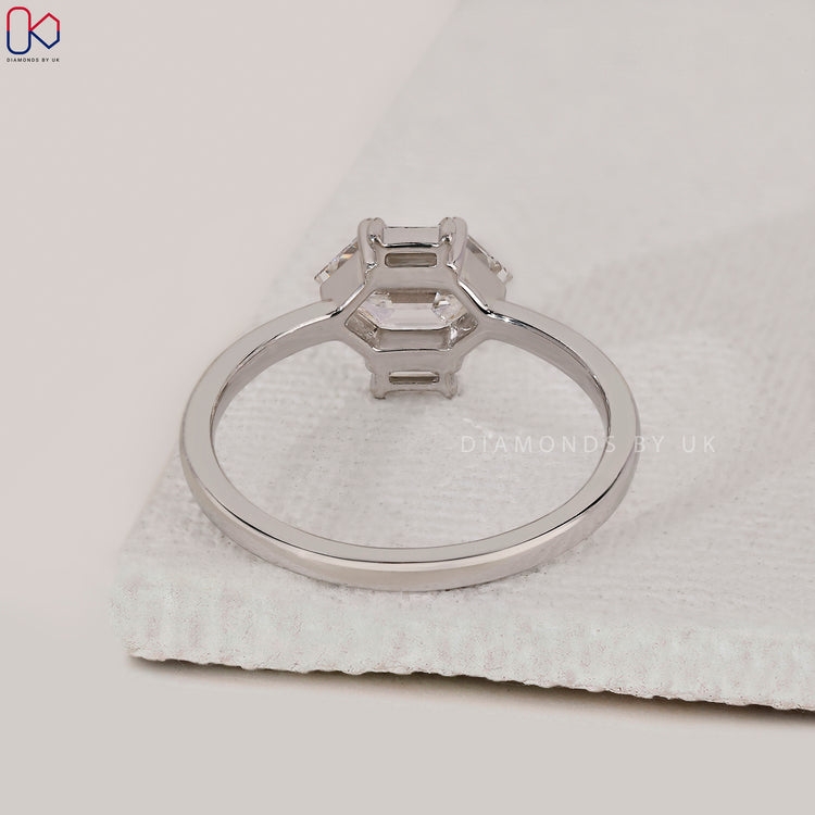 Lab grown east west diamond engagement ring.
