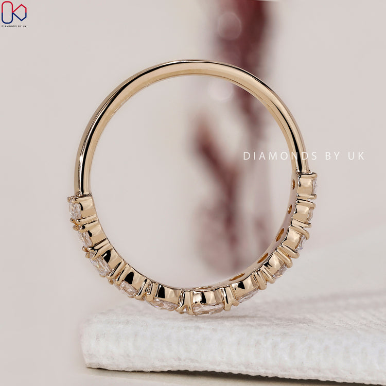 Handmade ring featuring rose cut diamonds in a delicate setting.
