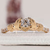 Gold Claddagh ring with Asscher diamond
