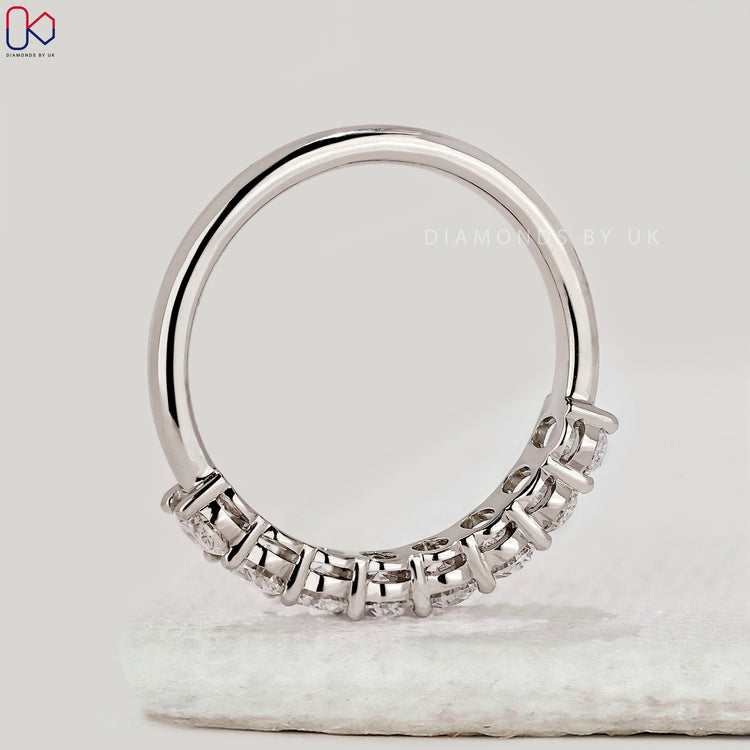 Handmade band with oval diamonds.
