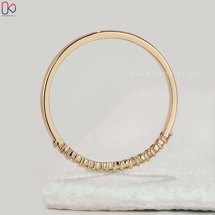 Custom diamond band with v shaped design.
