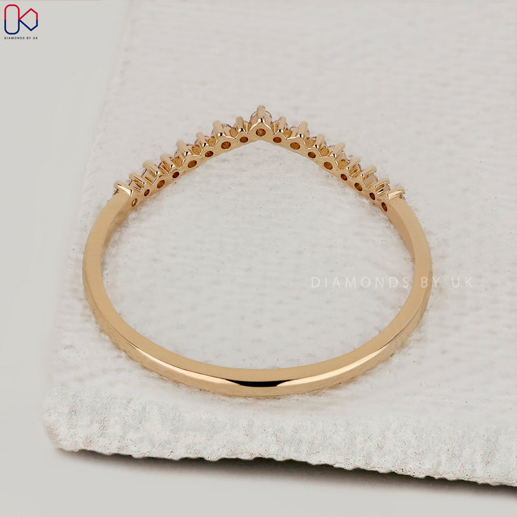 Handmade jewellery curved diamond band.
