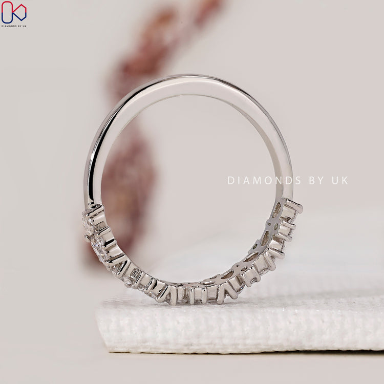 Lab Grown Diamond band with pear and round diamonds.
