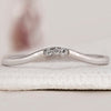 Curved Wedding Band White Gold with elegant design.
