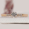 Yellow gold diamond ring with side stones
