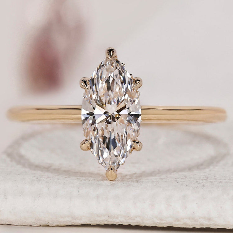 Marquise Cut Diamond Ring In Hidden Halo Setting