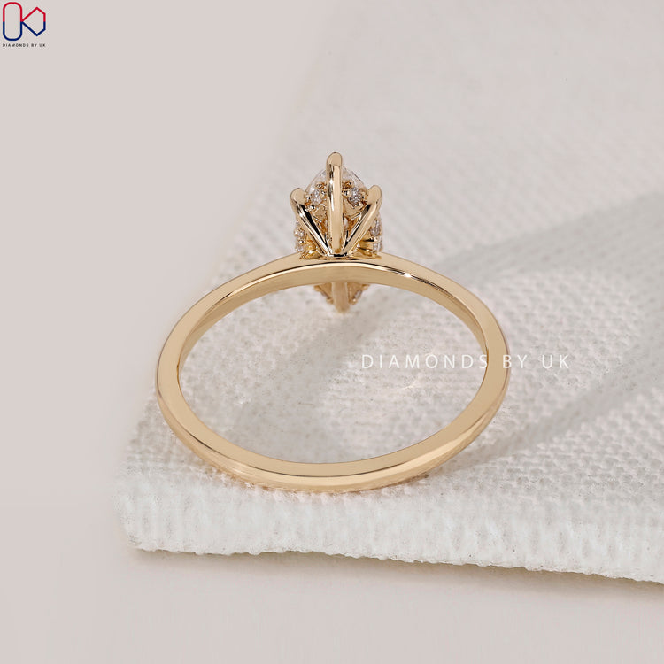 Handmade marquise diamond ring with six prong setting.
