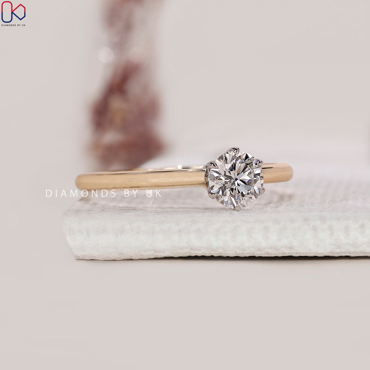 Yellow and white gold engagement ring
