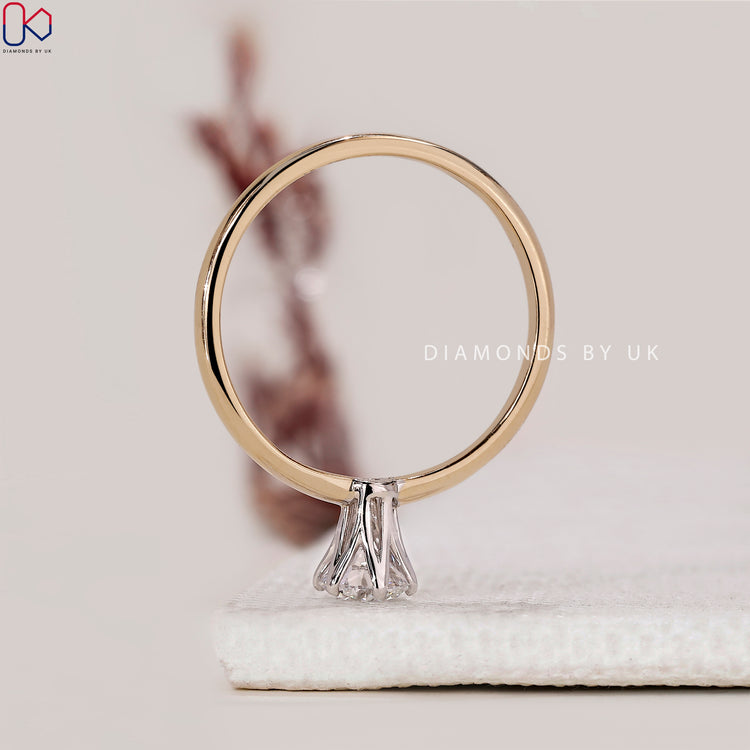 Tulip setting diamond engagement ring
