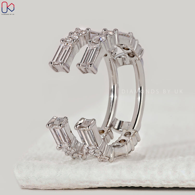 Shared prong wedding band with baguette and round diamonds.
