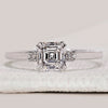 Asscher cut diamond engagement ring in white gold.
