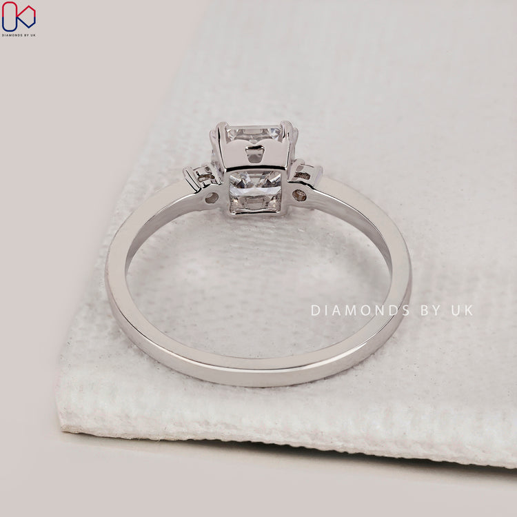 Handmade jewelry featuring Asscher and round cut diamonds.
