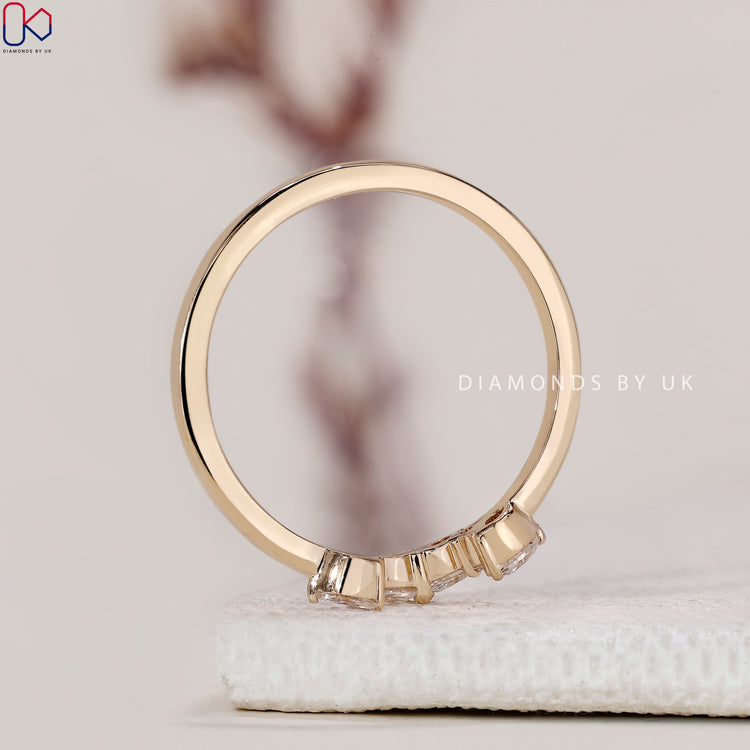 Prong set wedding band for secure and elegant diamonds.
