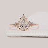 Pear shaped engagement ring in yellow gold.
