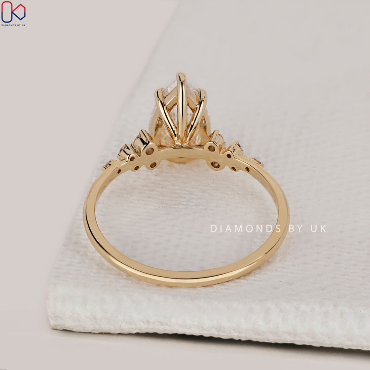Custom diamond ring handcrafted in yellow gold.
