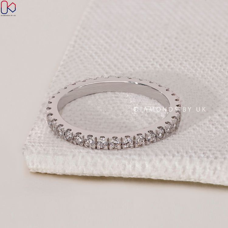 Lab grown diamond wedding band offering eco-friendly luxury.

