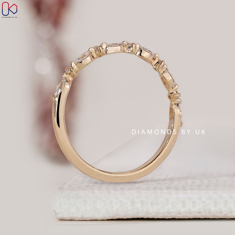 Custom diamond band crafted by Diamondsbyuk
