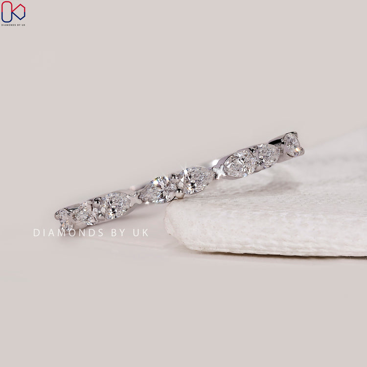 Diamondsbyuk wedding band in white gold wedding band.
