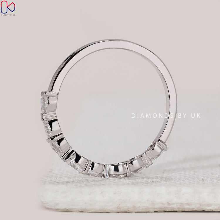 Handmade band with white gold wedding band.
