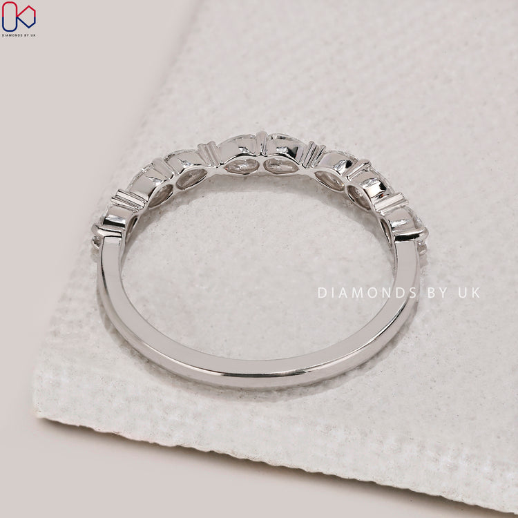 Handmade jewellery with diamond half eternity band.
