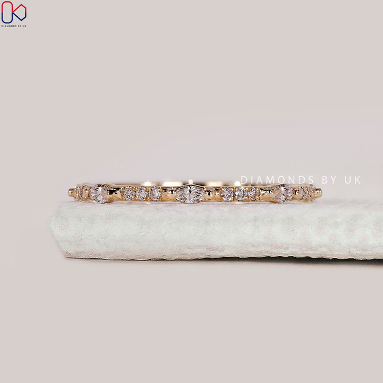 Buy wedding band with marquise diamond band.
