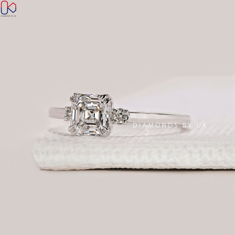 Double claw prong Asscher cut diamond ring.
