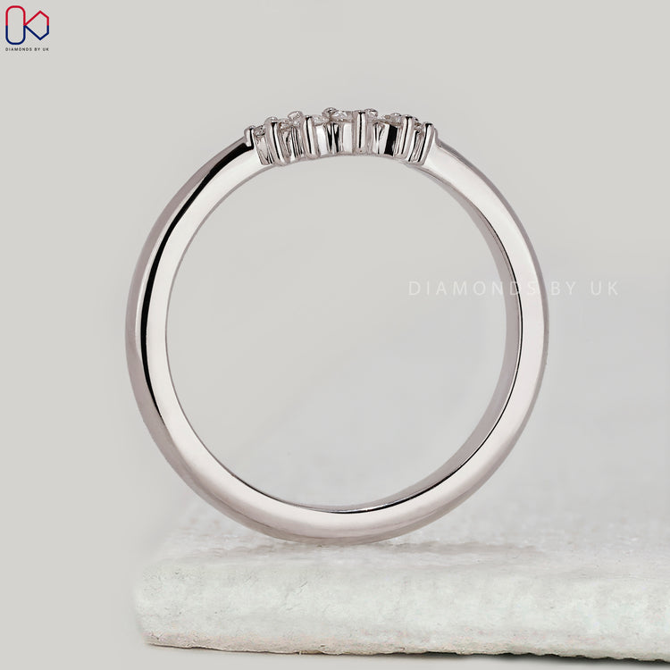 Custom diamond band with tiara design.
