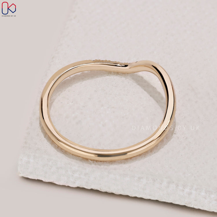 Custom diamond band with wave design.
