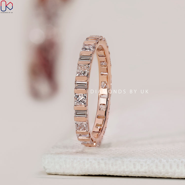 Lab grown diamond eternity ring with modern setting.
