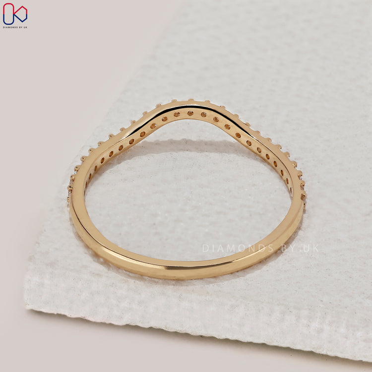 Handmade band with round diamonds.
